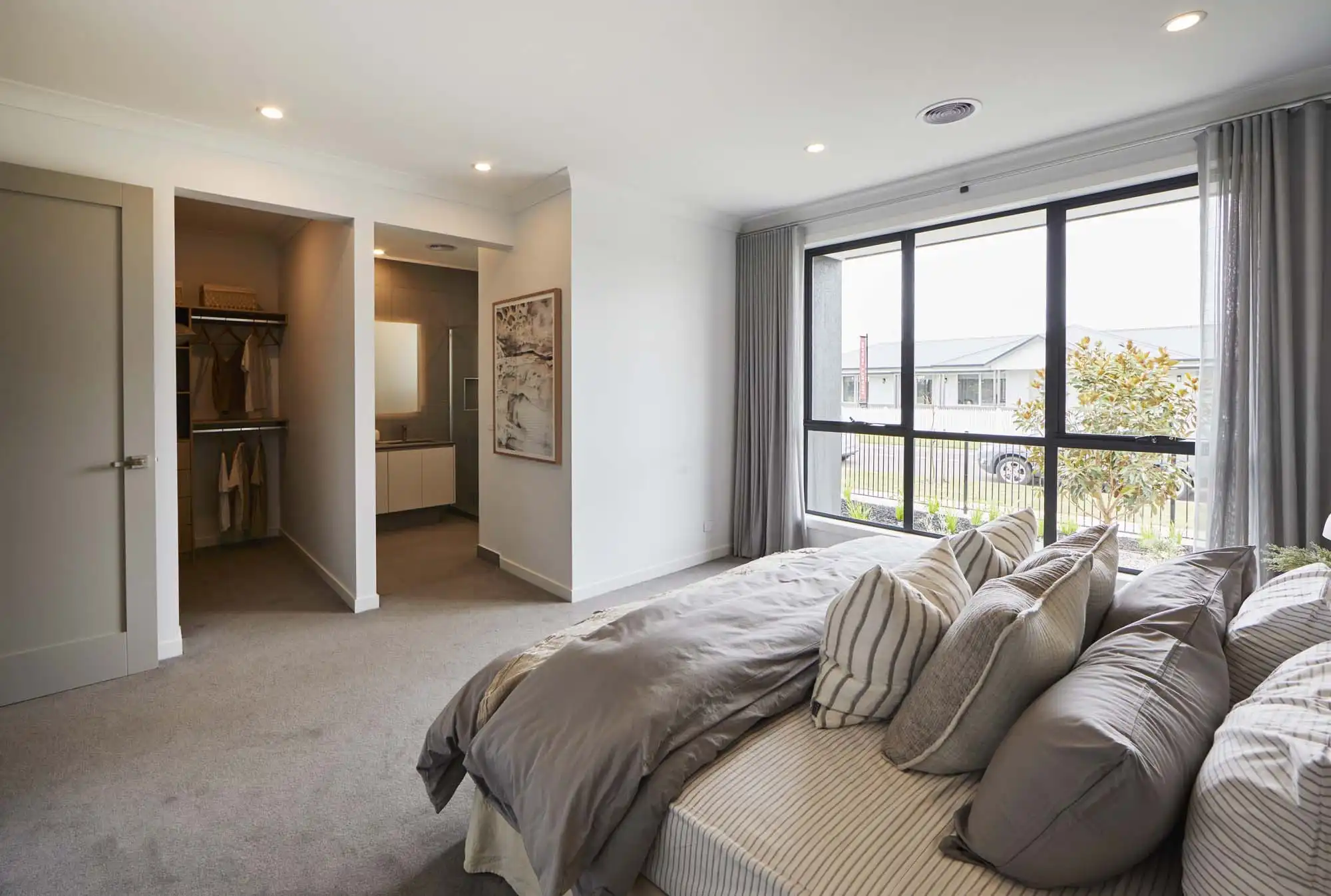 open master and ensuite single storey home with floor to ceiling curtains at dromana 28