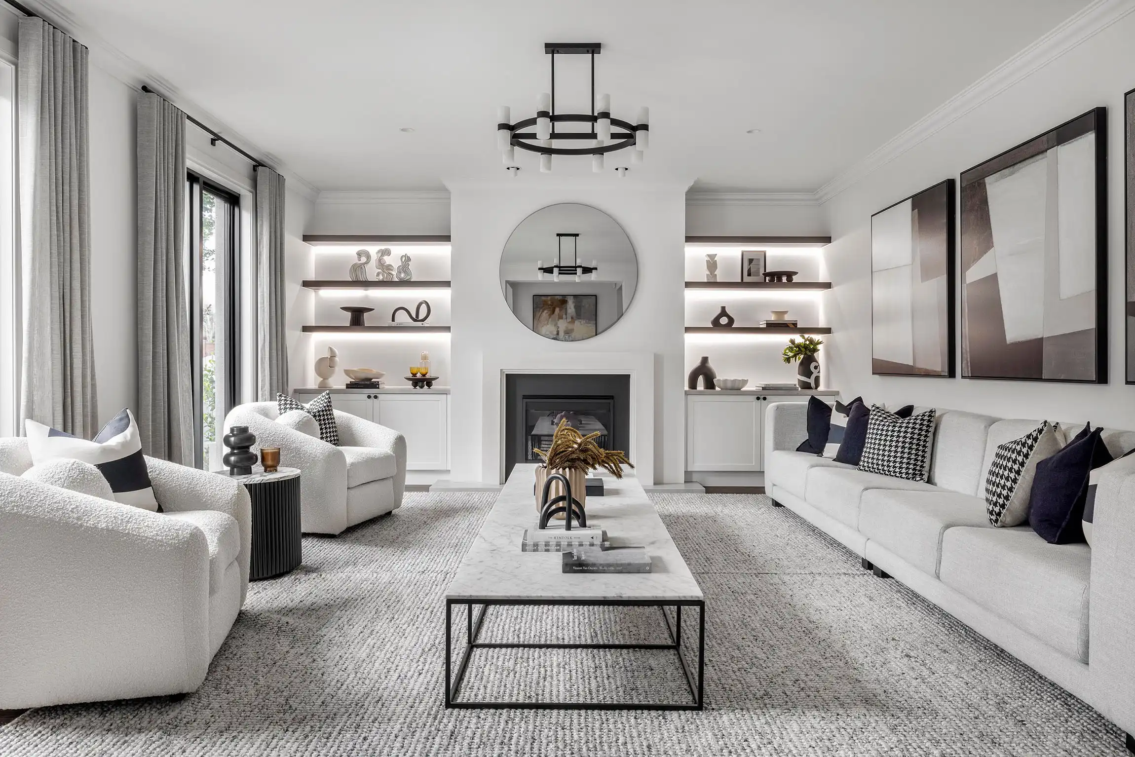 Durrant Masterpiece home with soft furnishing and timber shelving with floor to ceiling curtains