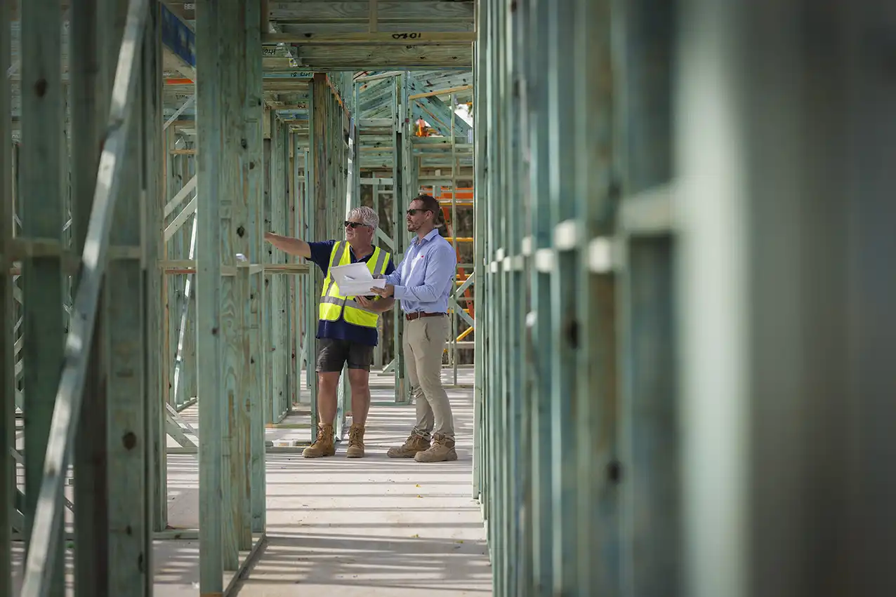 Builders evaluating a Simonds home