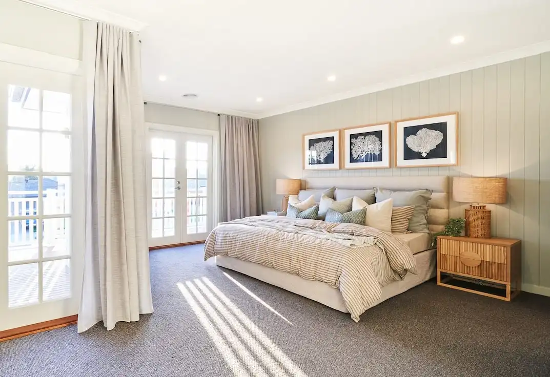beige coloured feature wall panelling for master bedroom