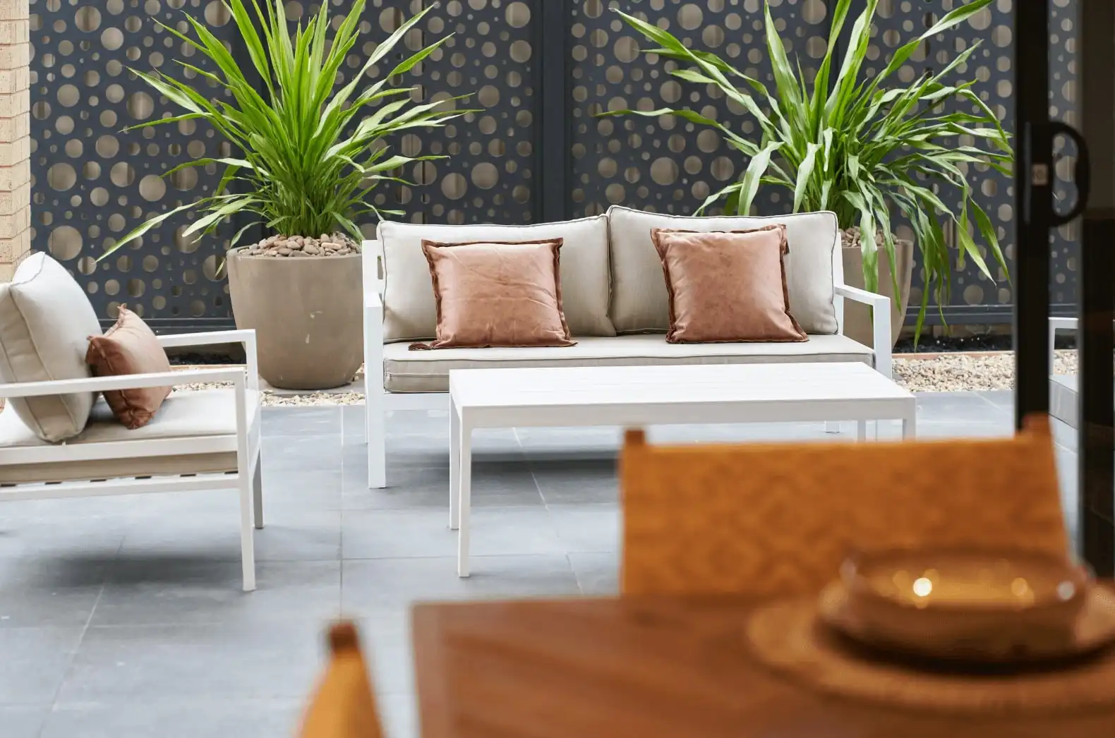 alfresco furniture design with a stylish metal fence panel at camperdown 33