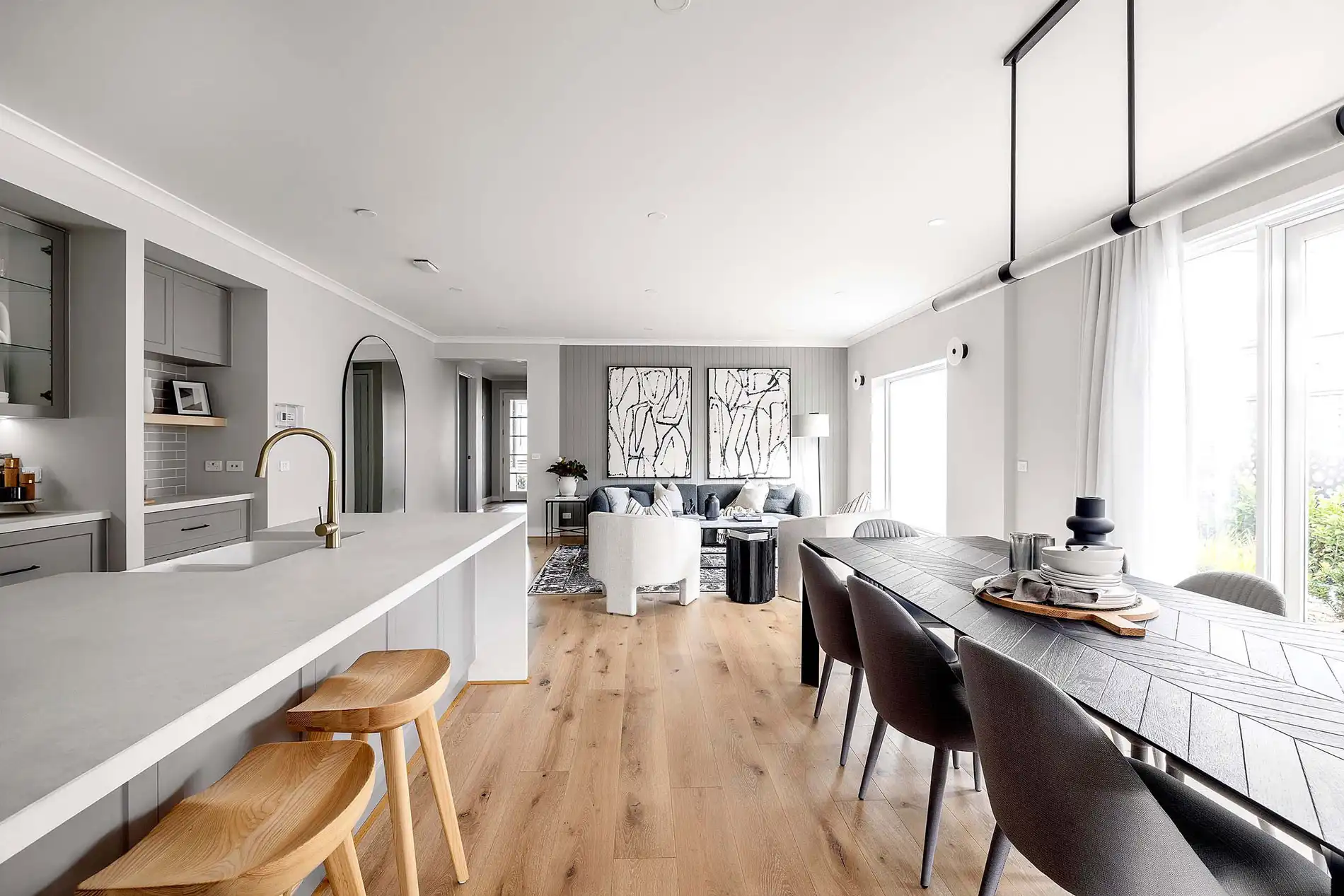 timber flooring with wood cladding on the feature wall using grey neutral tones