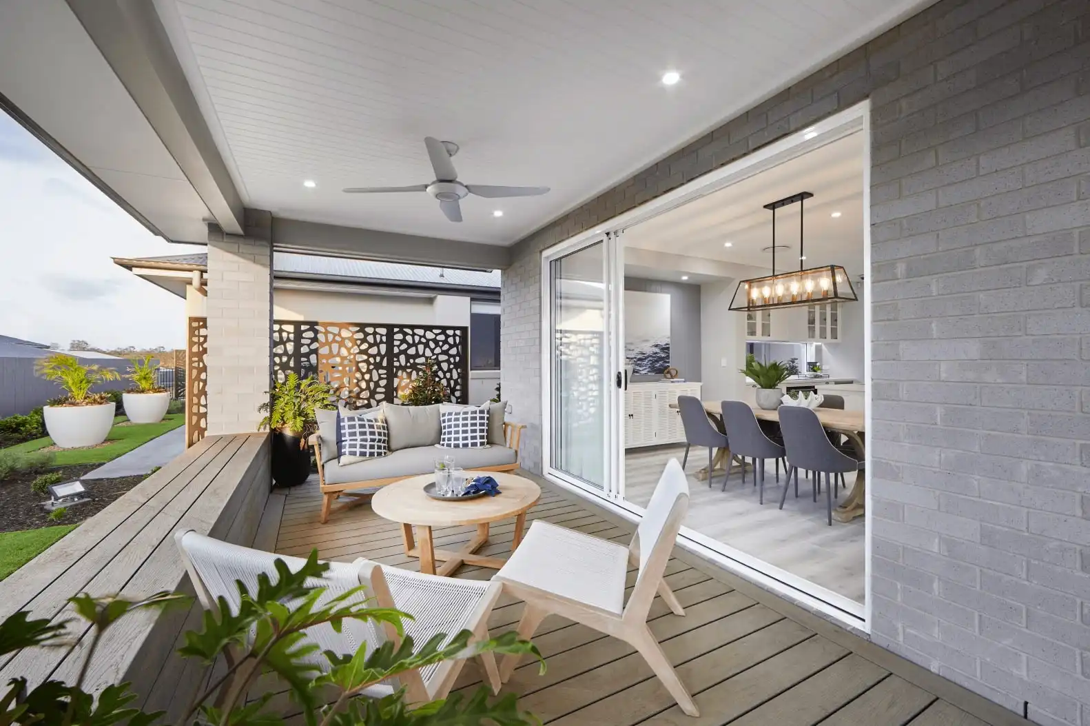 a simple decking bench that still gives a seamless and stylish effect throughout the alfresco at newbery 27