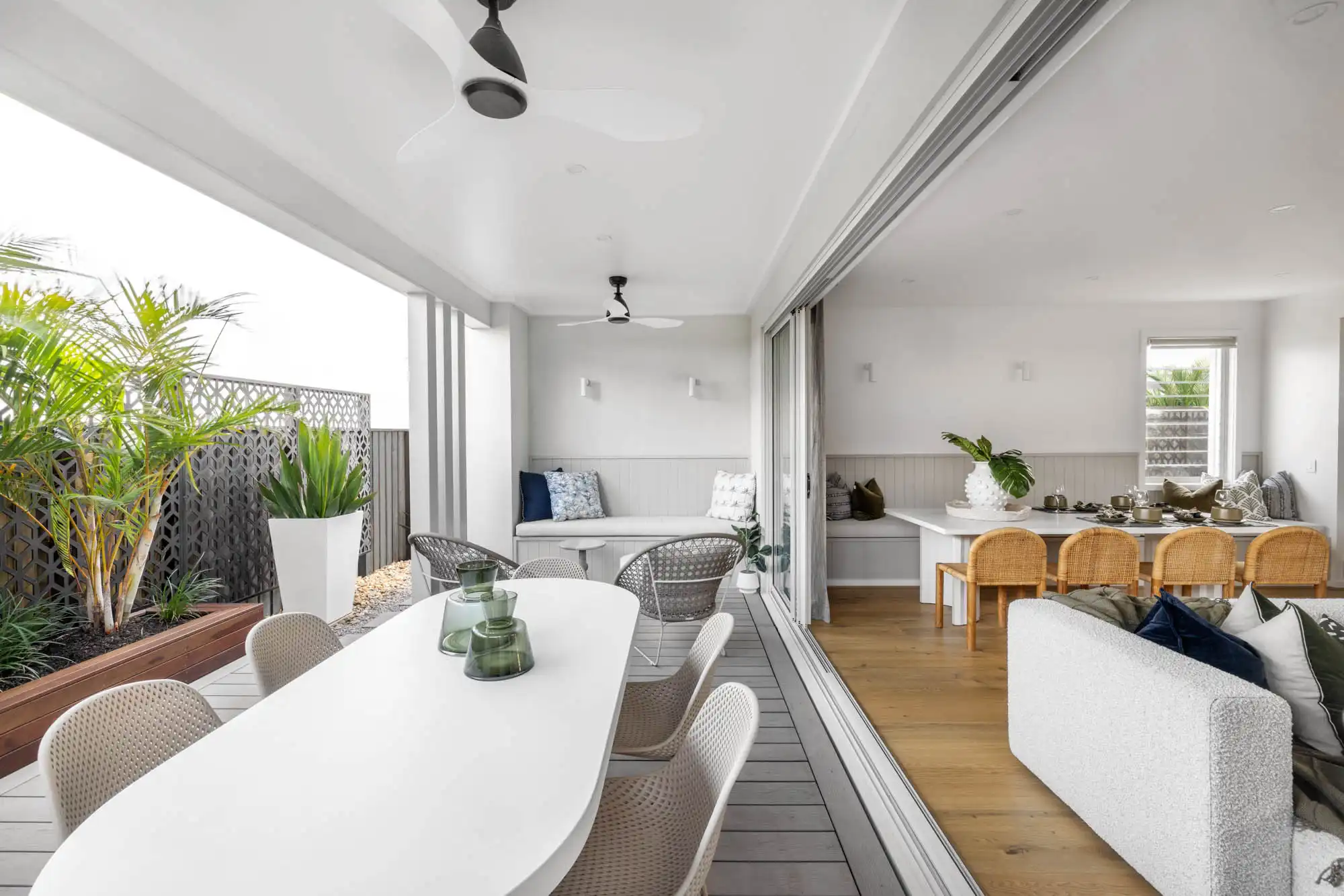 combining alfresco and dining living area with sliding doors that open the whole space up at travertine 31