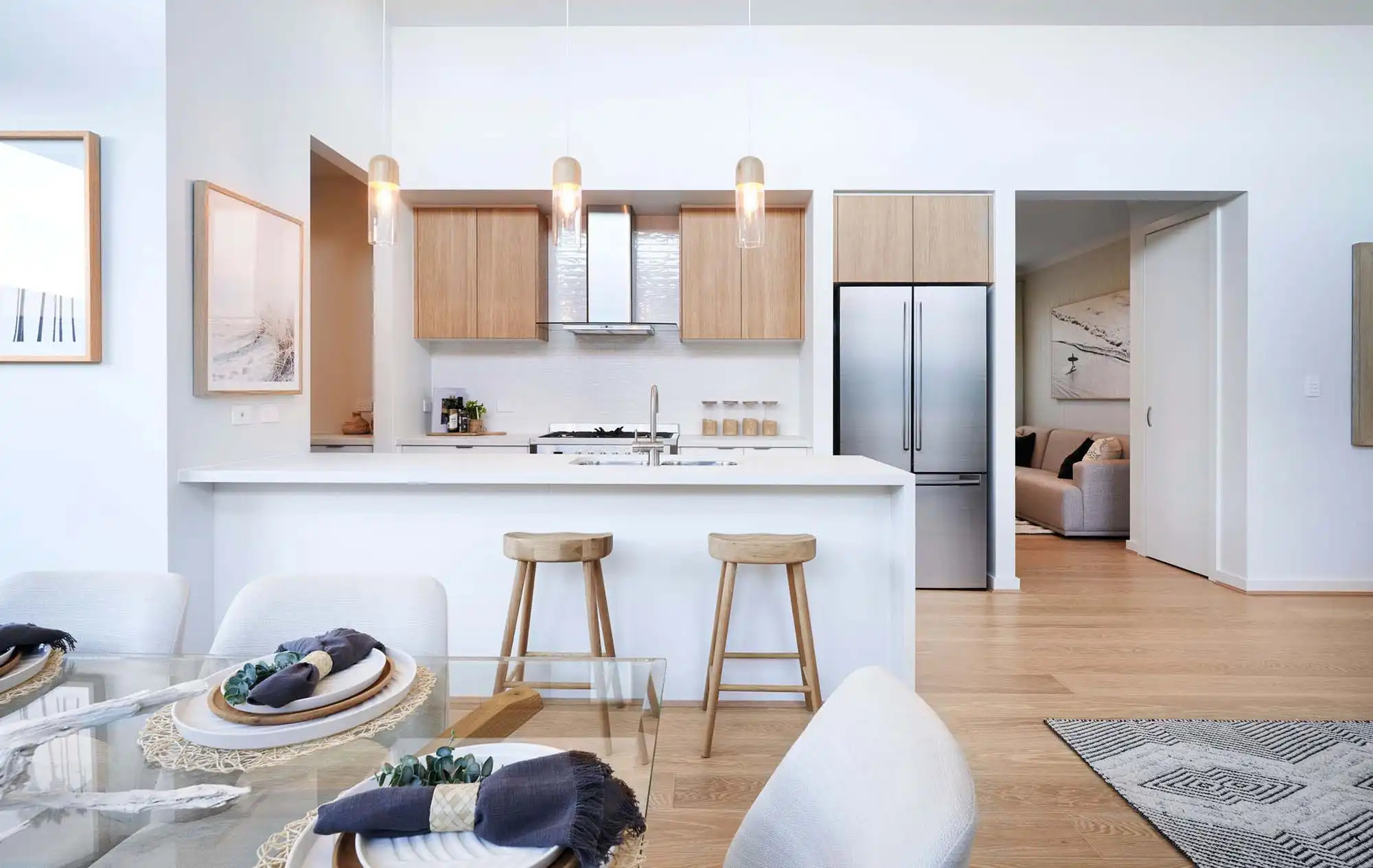 coastal kitchen design with timber cabinetry and pendant lighting