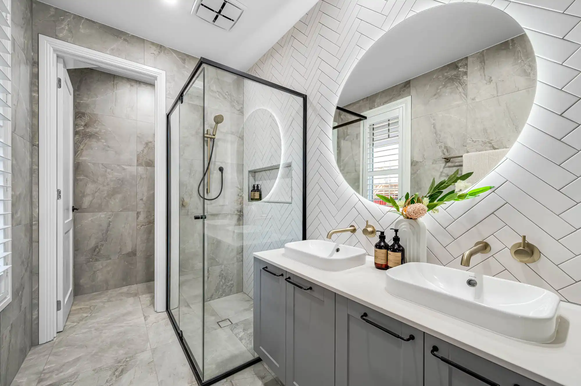 Interior photo of a modern bathroom with tiled floors and a shower cubicle as part of Simonds Ascot 28 home design.