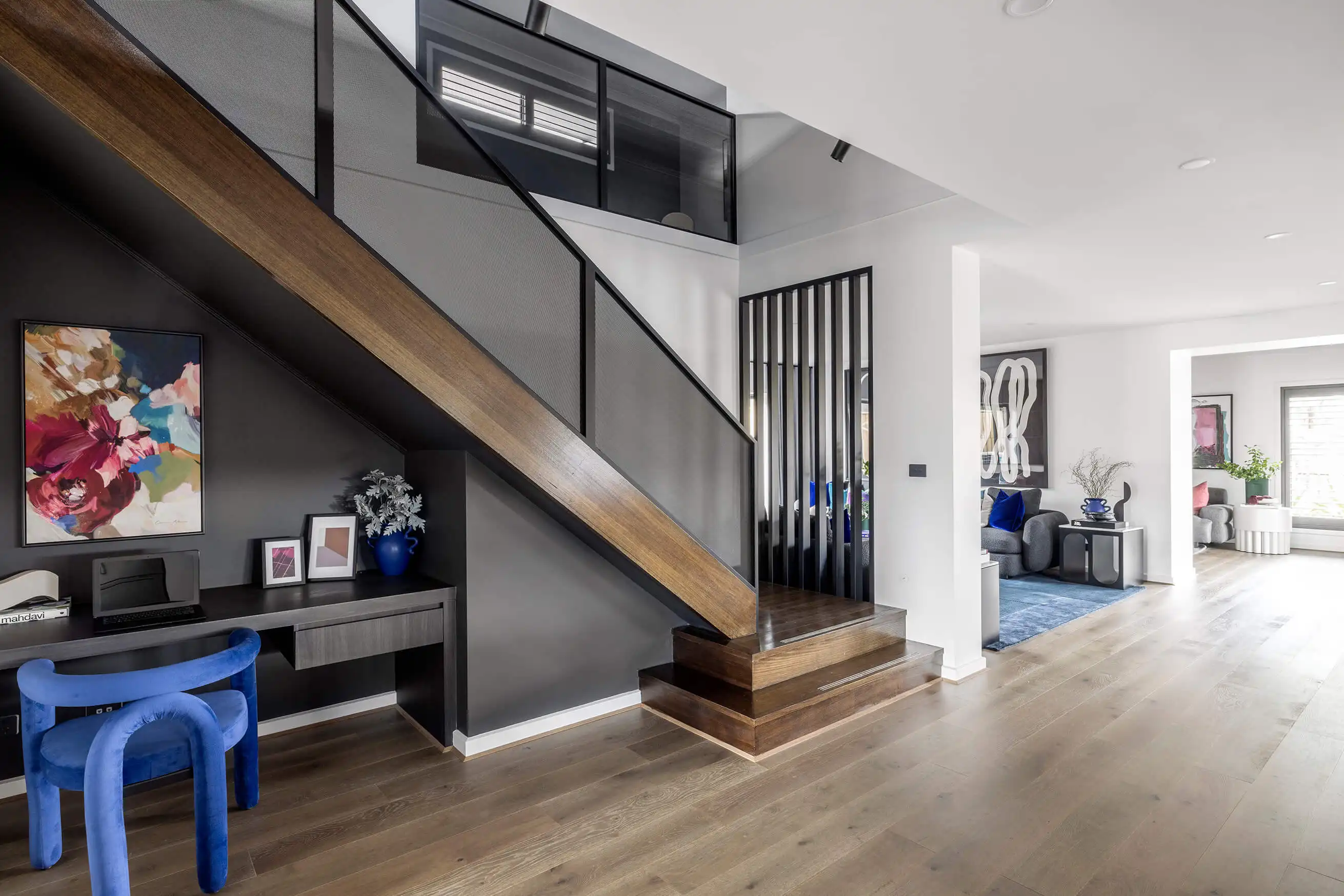 Study nook under staircase and timber features to brighten up the space at silverton 45 lilydale