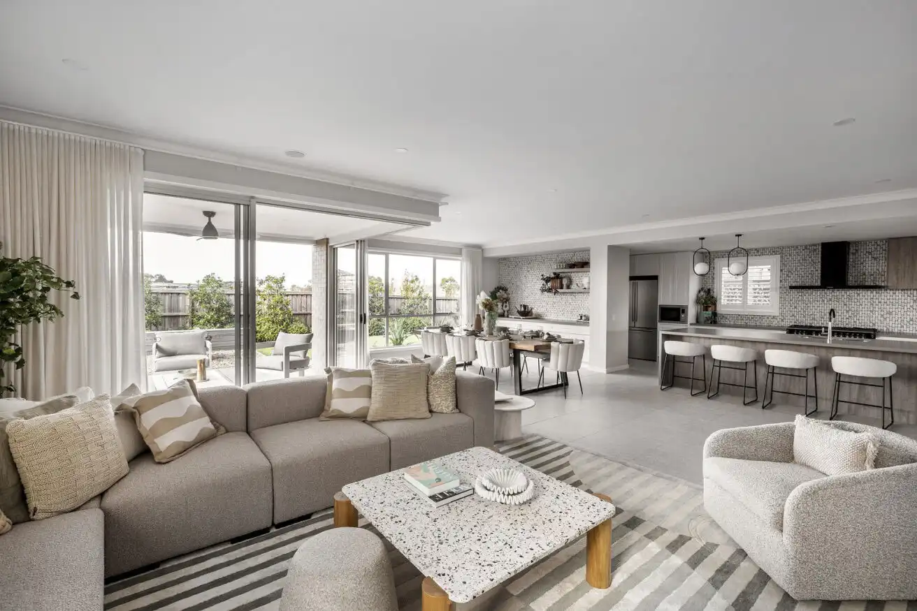 shades of beige, grey and light wood tones with a terrazzo style coffee table adds contemporary touch at tallowood 52