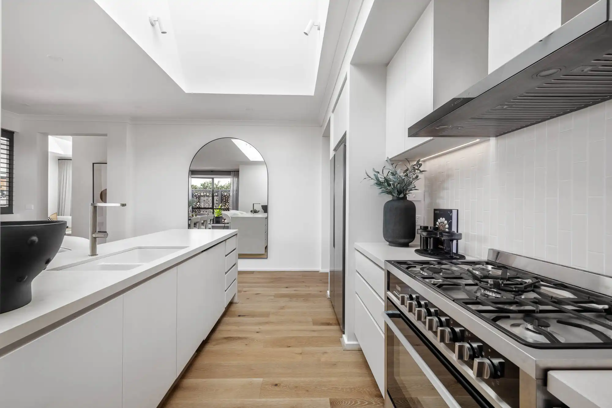 skylight built in kitchen to brighten up the space with a blend of timber flooring at balsa 28 in werribee