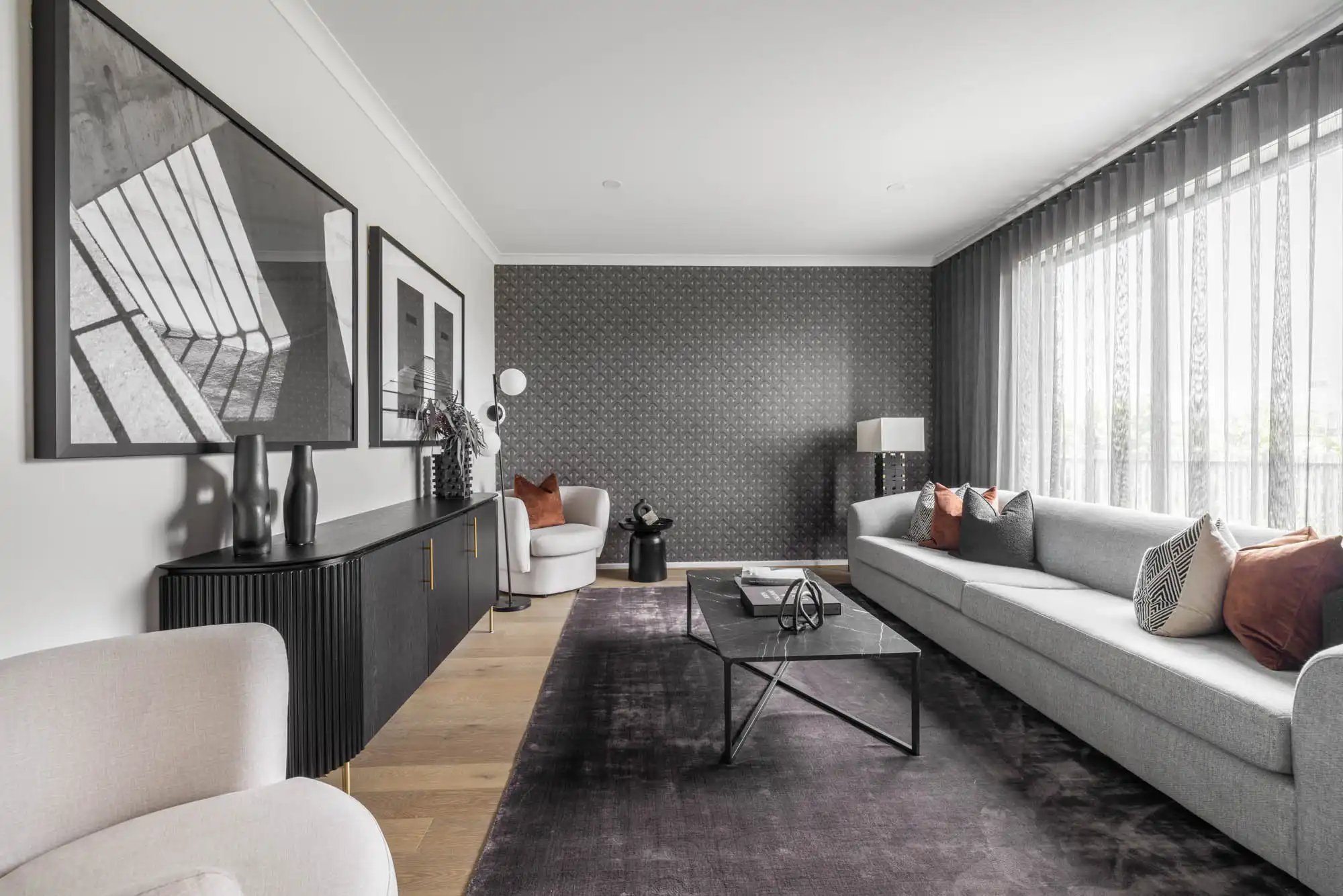 featured wallpaper and a monochromatic tone inspiration with bold coloured cushions at lomandra 42