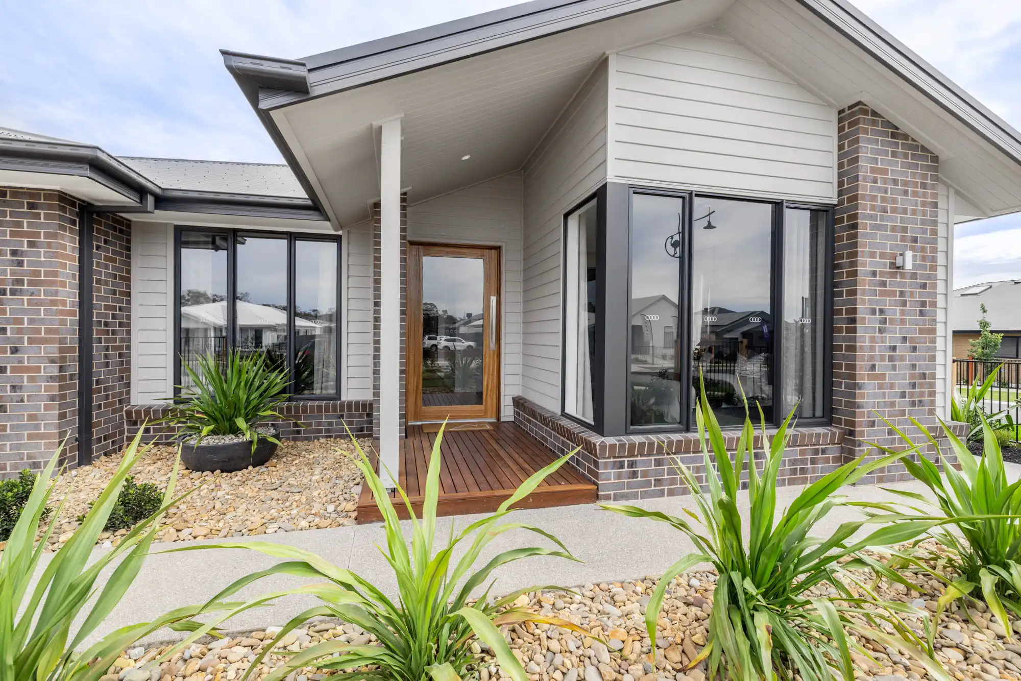 wood cladding and polychrome brickwork facade at the redhill 30