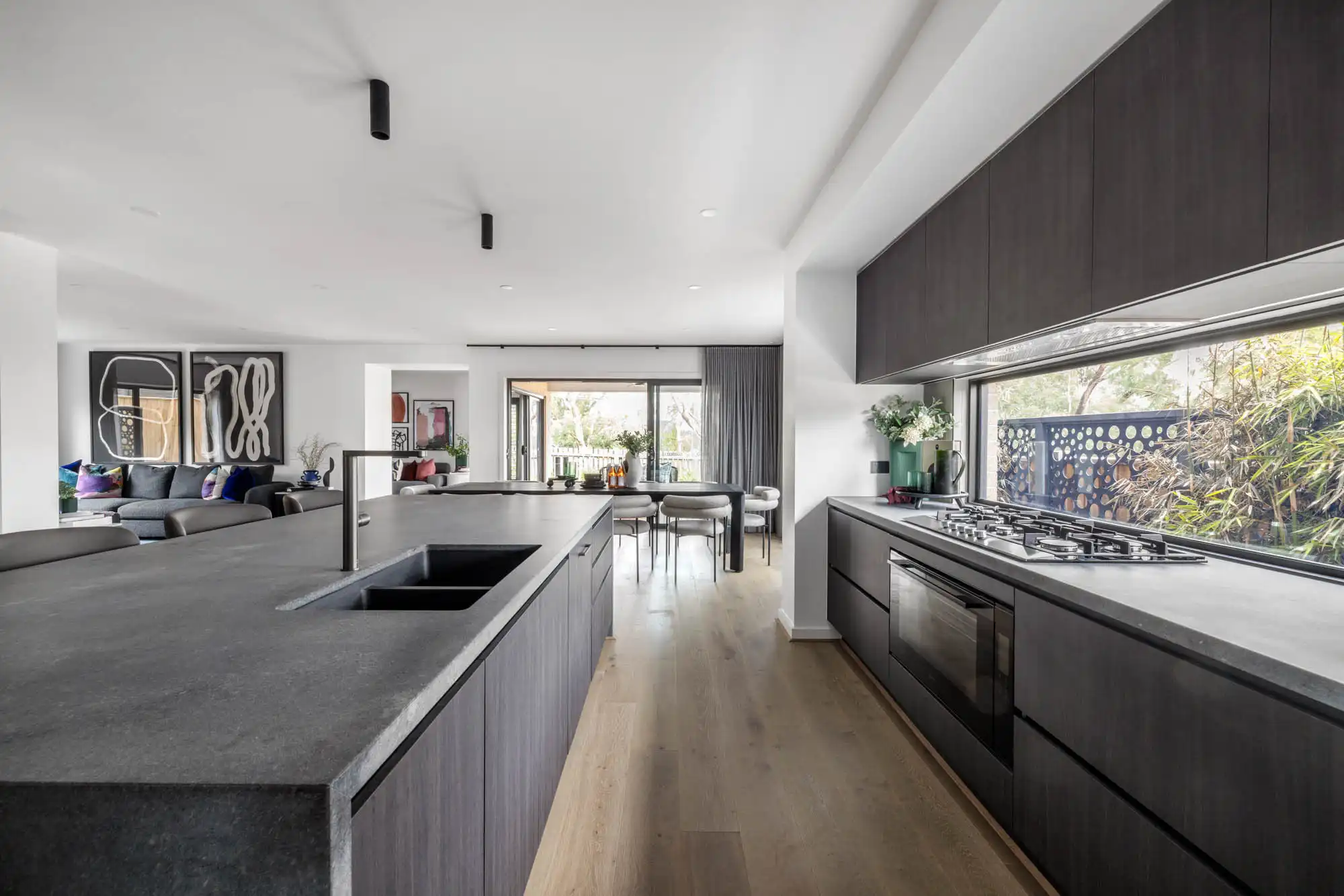 windowtche placed in kin throughout the whole space balances the light and dark tones of the warm wood accents at silverton 45