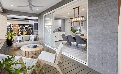 timber decking and wooden furnitures creates a rustic vibe for this alfresco space