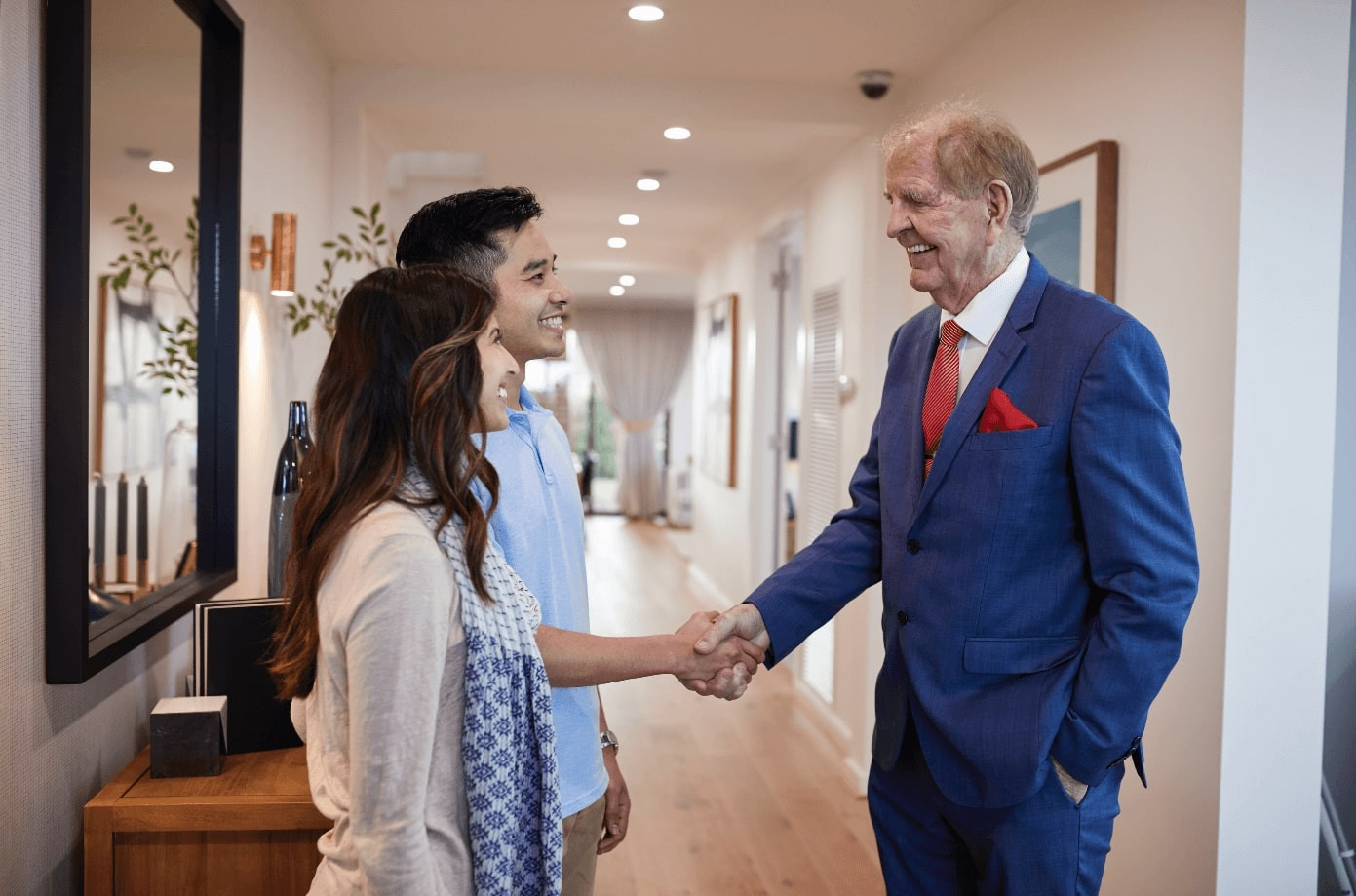 Gary simonds congratulating a first home buyer with a simonds built