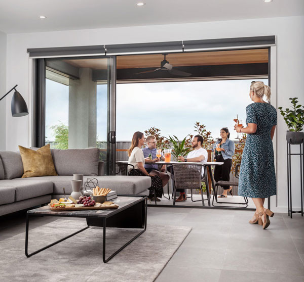 timber ceiling in alfresco with grey tiling throughout living area