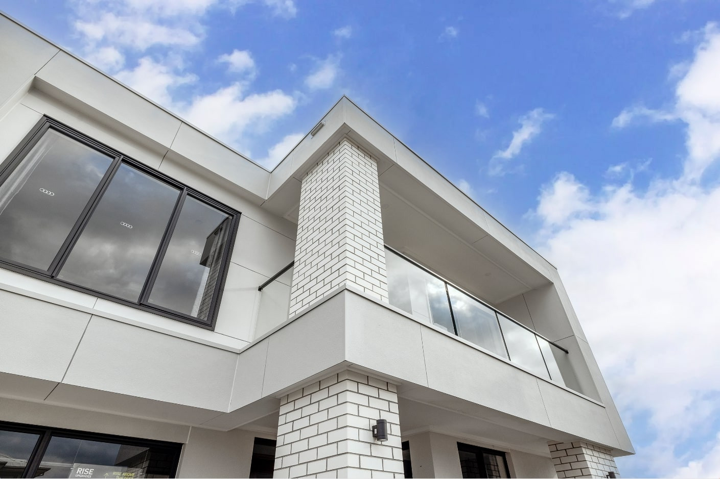 modern contemporary facade with white finishing and black skirting at silverton 45